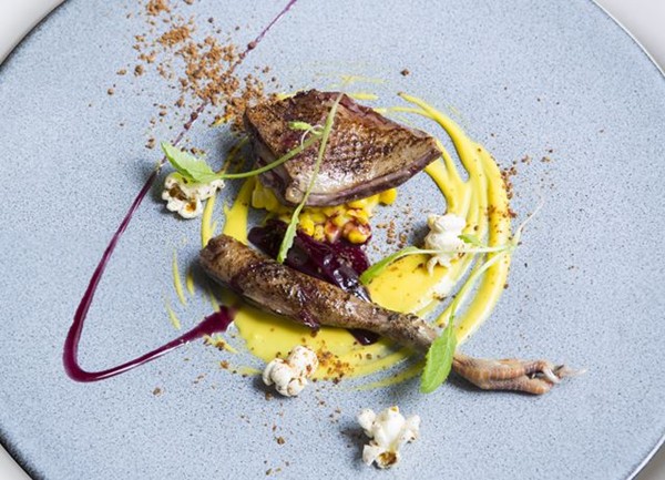 Anjou pigeon, sweetcorn purée, red onion petals and bacon popcorn