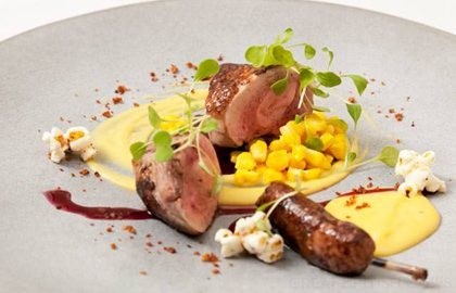 Anjou quail with bacon popcorn