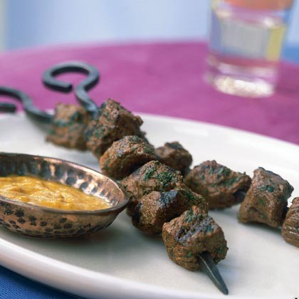 Anticuchos with roasted yellow pepper sauce (Peruvian beef kebabs)