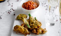 Antipasto of Parmesan battered tenderstem broccoli with salsa rossa