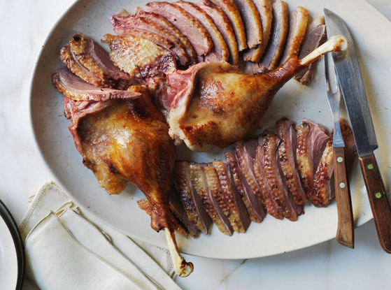 Apple-and-chestnut-stuffed roast goose with egg noodles