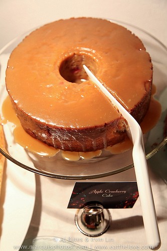 Apple and cranberry cake with brown sugar glaze
