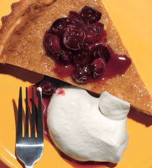 Apple cider and maple cream tart with maple-cranberry compote