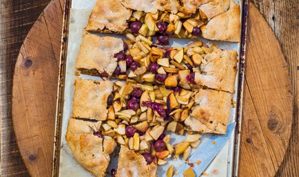 Apple, pear, and Concord grape galette in rye pastry with ginger cream
