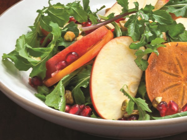 Apple, pistachio, persimmon, and pomegranate salad
