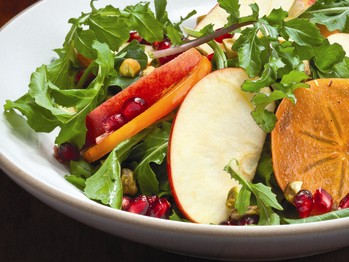 Apple, pistachio, persimmon, and pomegranate salad