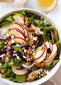 Apple salad with candied walnuts and cranberries