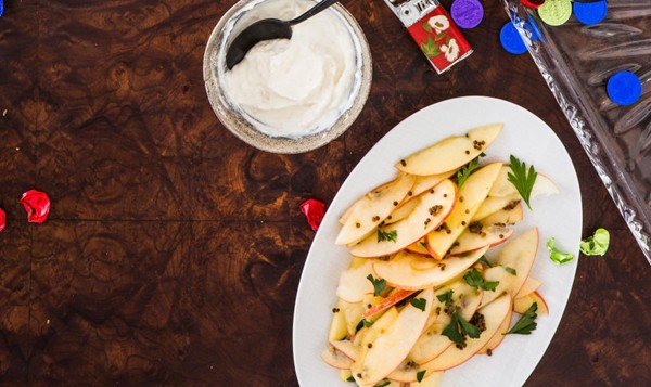 Apple salad with toasted mustard seeds and herbs