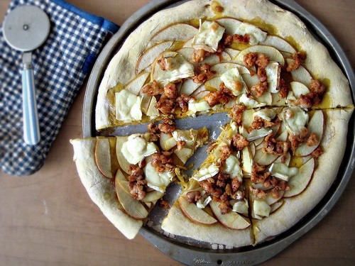 Apple, sausage, and Brie pizza on a pumpkin pizza dough crust