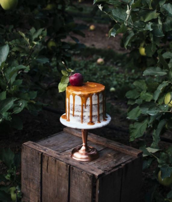 Apple-walnut spice layer cake with Swiss meringue frosting and caramel drip