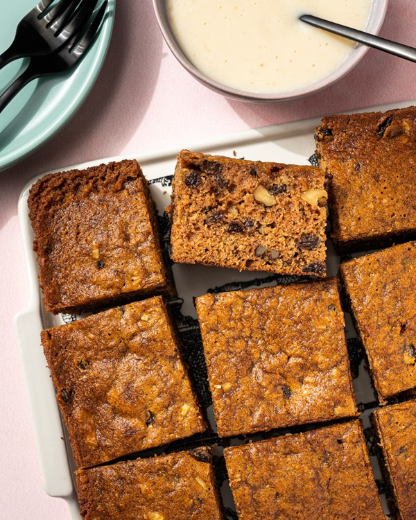 Applesauce cake with hot rum sauce
