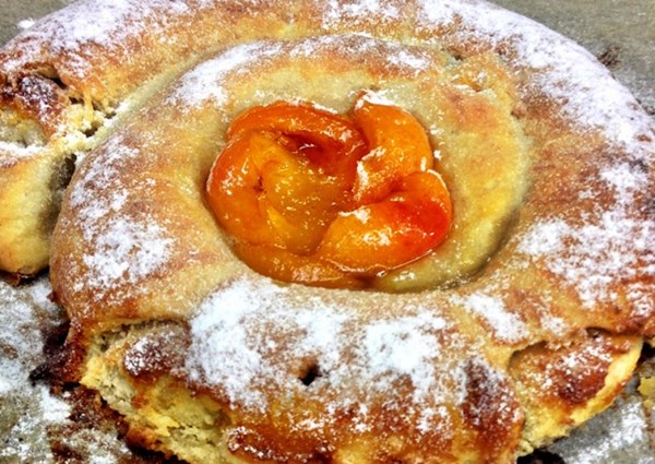 Apricot and almond ensaimada