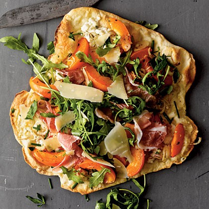 Apricot and prosciutto thin-crust pizza