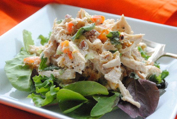Apricot chicken salad with basil and almonds