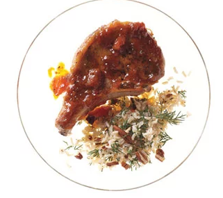 Apricot-glazed pork chops with brown rice-pecan pilaf