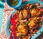 Apricot orange horseradish air fryer chicken thighs with rainbow confetti salad