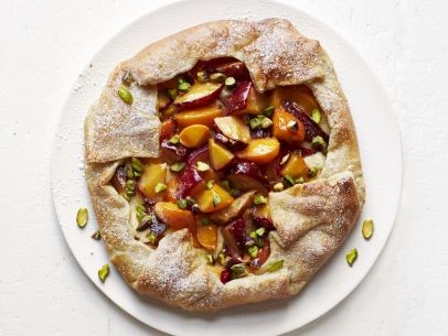 Apricot-plum galette with cream cheese and pistachios