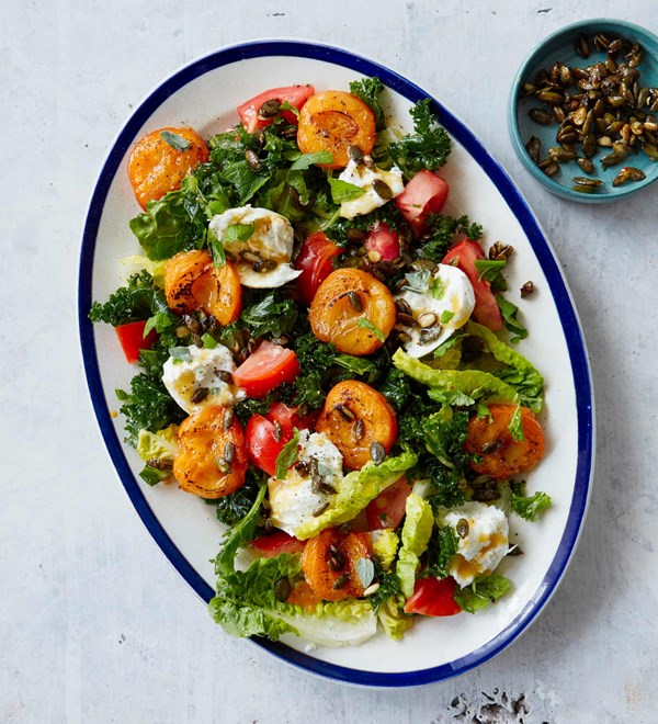 Apricot salad with burrata, kale and crunchy seeds