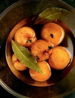 Apricots in muscat syrup with thyme & bay leaf