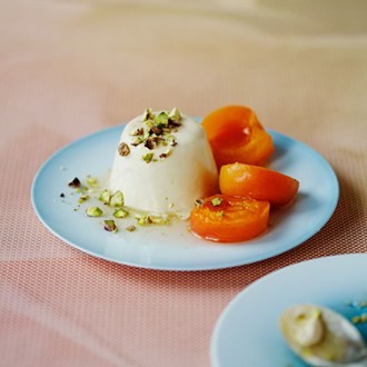 Apricots in orange flower syrup with burnt honey and yogurt pannacotta