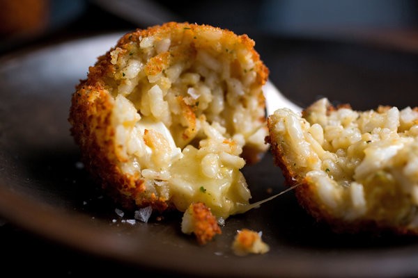 Arancini with brandy-soaked raisins
