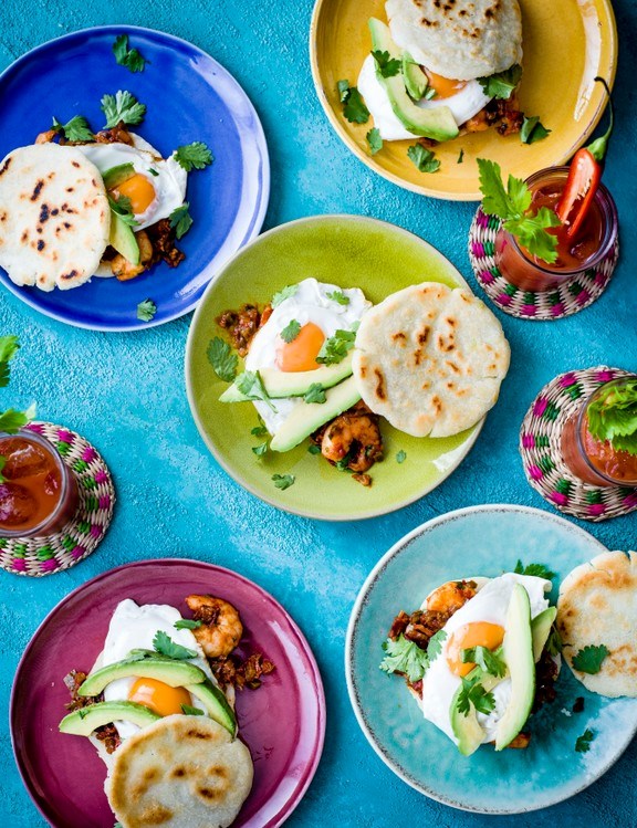 Arepas with eggs, avocado and Creole sauce