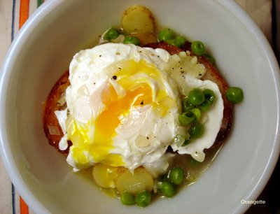 Aromatic broth with peas, potatoes, and a poached egg