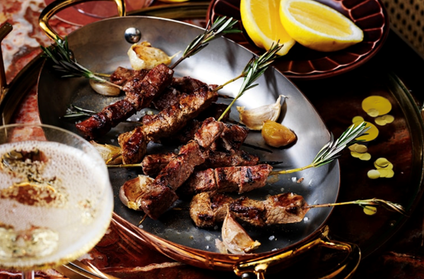 Arrosticini lamb skewers with roasted garlic aioli
