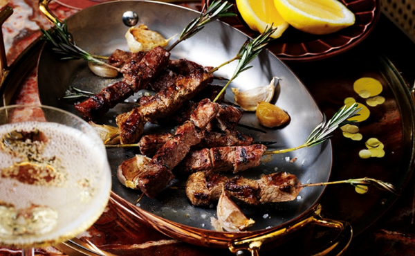 Arrosticini lamb skewers with roasted garlic aioli