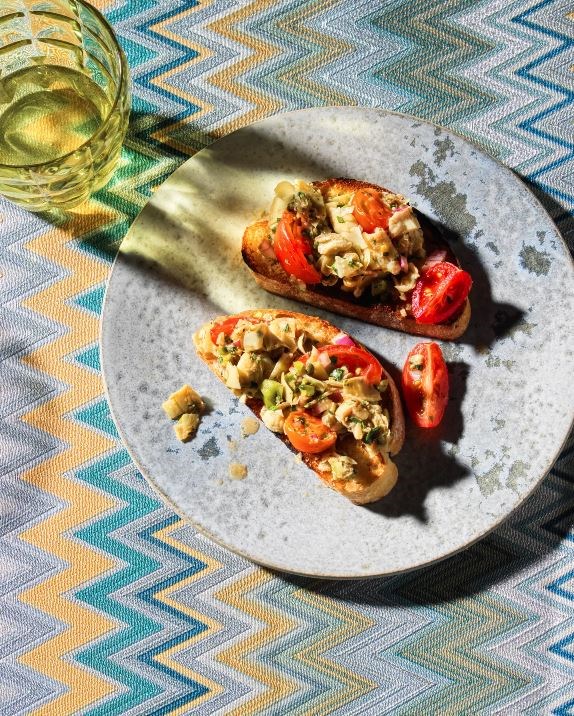 Artichoke bruschetta with capers and cherry tomatoes [Katie Reicher]