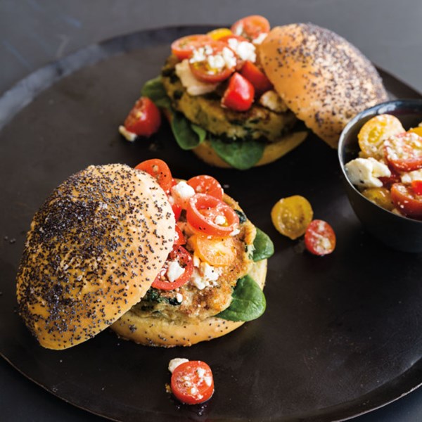 Artichoke-spinach burgers with tomato-feta topping