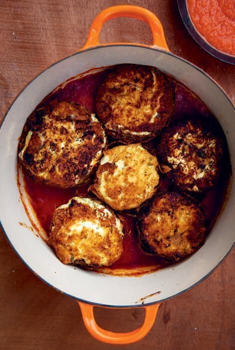 Artichokes with brocciu cheese in a tomato sauce base