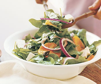 Arugula and mint salad with oil-cured black olives, oranges, and ricotta salata