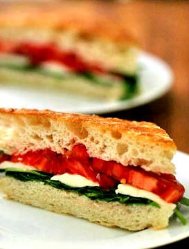 Arugula, mozzarella, tomato on focaccia
