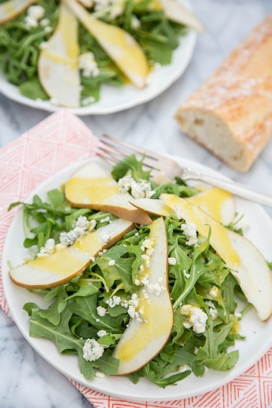 Arugula, pear & and blue cheese salad with warm vinaigrette