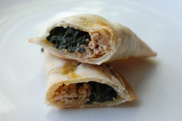 Arugula pesto, spicy pork, and spinach pockets