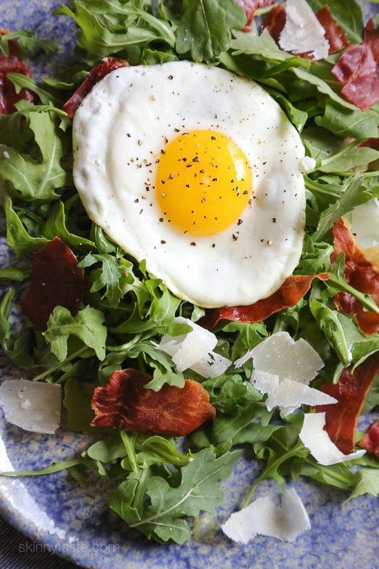 Arugula salad with crispy prosciutto, Parmesan and fried eggs