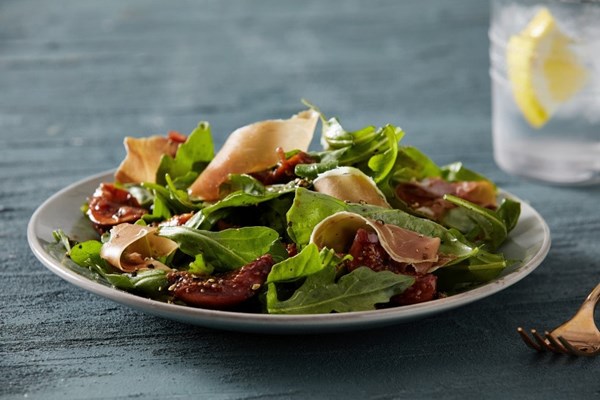 Arugula salad with figs agrodolce and prosciutto