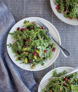 Arugula salad with pomegranates and pistachios