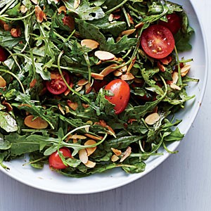 Arugula, tomato, and almond salad