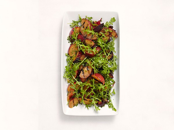 Arugula with grilled plums