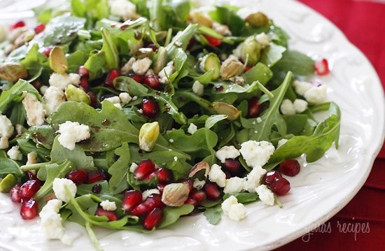 Arugula with pomegranates, blue cheese and pistachios