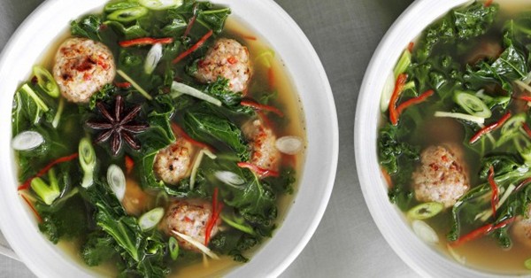Asian broth with meatballs and winter greens