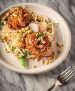 Asian noodle salad with crab cakes