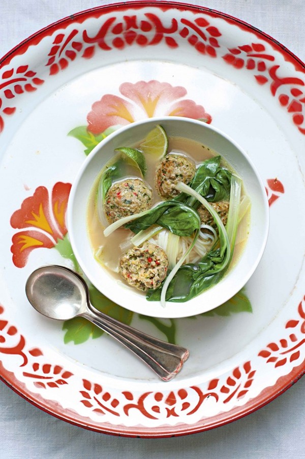 Asian pork balls with Swiss chard in a sweet and sour chicken broth