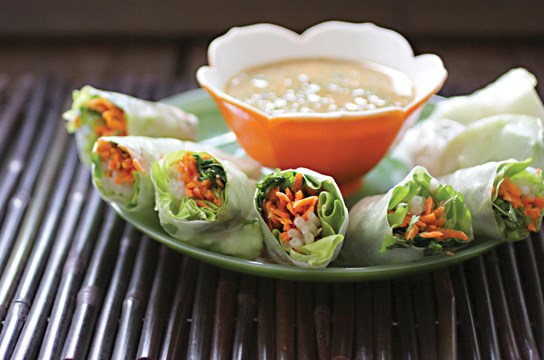 Asian spring rolls with spicy peanut dipping sauce