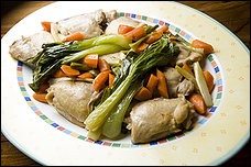 Asian-style braised chicken thighs with carrots and bok choy