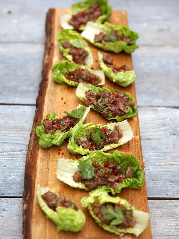 Asian-style tuna ceviche served in lettuce cups