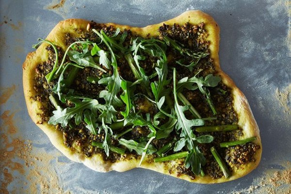 Asparagus and arugula pizza with vegan pesto