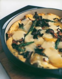 Asparagus and mushroom pudding with melting Fontina